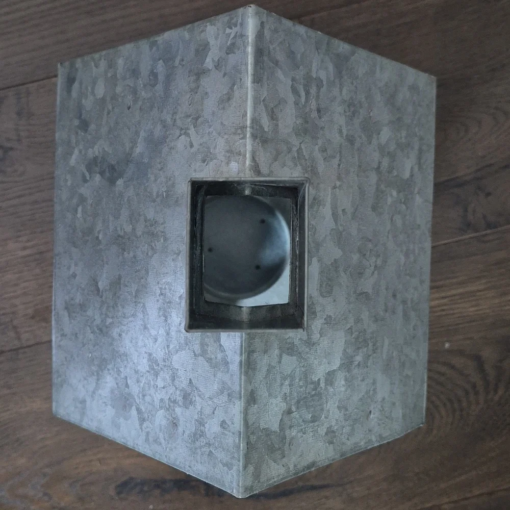Metal House Lantern with Star Cutout, holds pillar candle